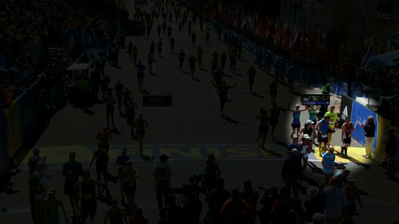 Illustration for article titled Marathon Runners Carrying Competitor Across Finish Line? Didn't Happen.